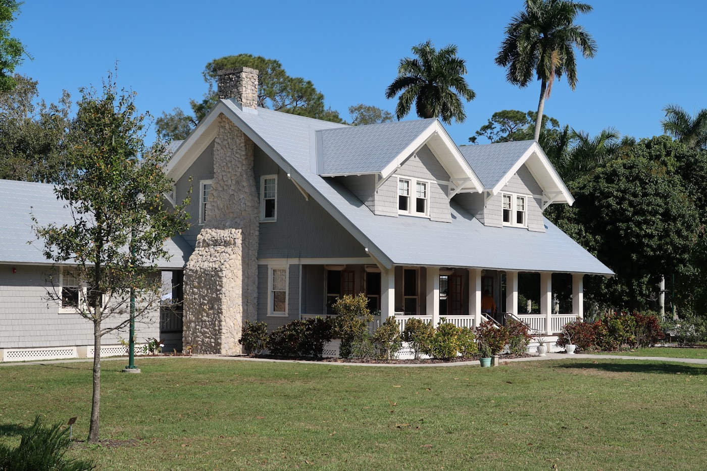 A single-family Florida home with palm trees