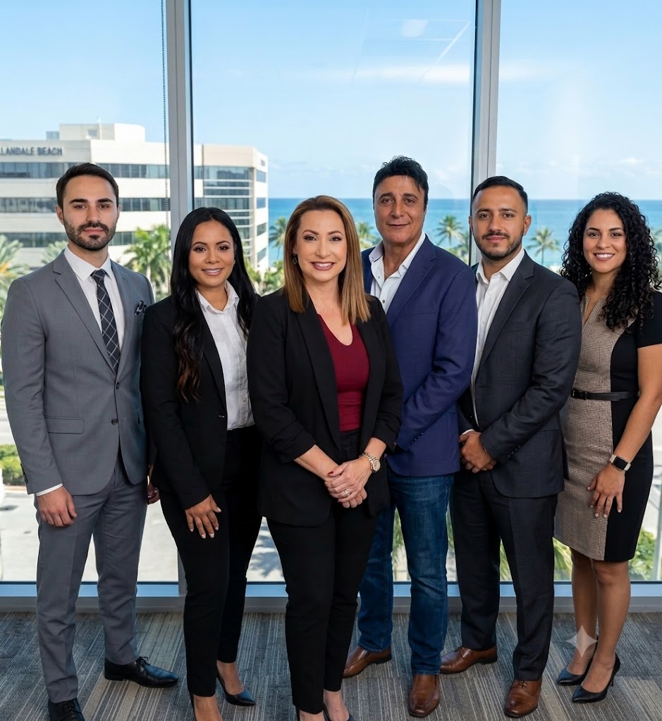 The EM Quick Close team standing together at our South Florida office